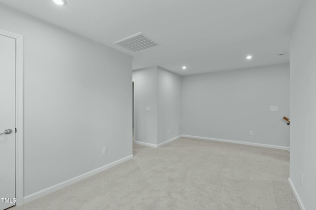 unfurnished room with baseboards, recessed lighting, visible vents, and light carpet