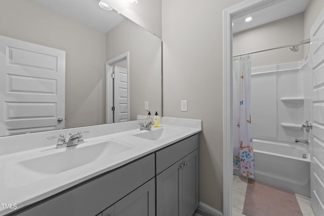 bathroom with a sink, shower / tub combo, double vanity, and tile patterned flooring