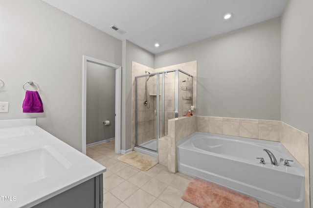 bathroom with visible vents, a shower stall, tile patterned flooring, a bath, and vanity