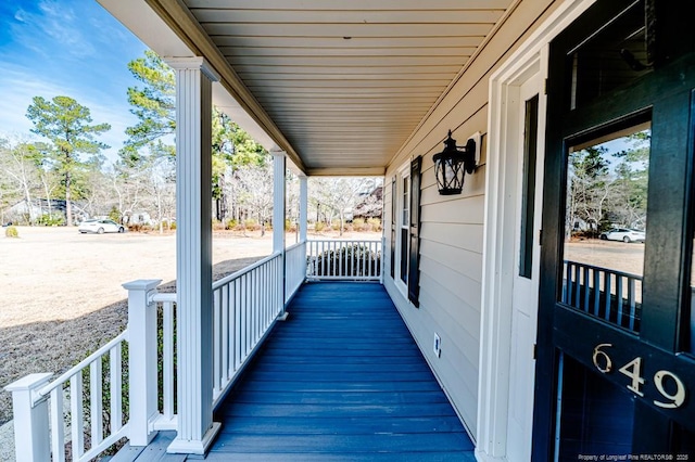 wooden deck with covered porch