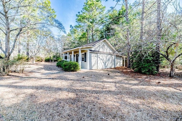 garage featuring driveway