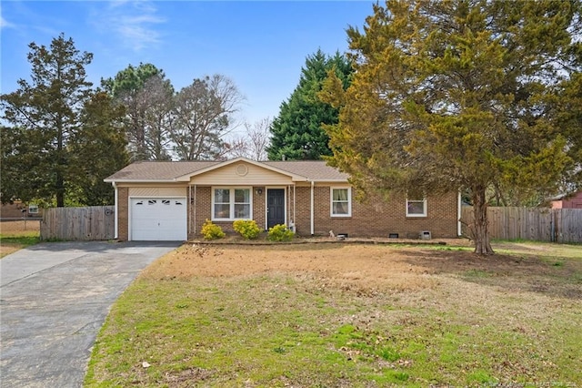 ranch-style home featuring brick siding, fence, a garage, and driveway