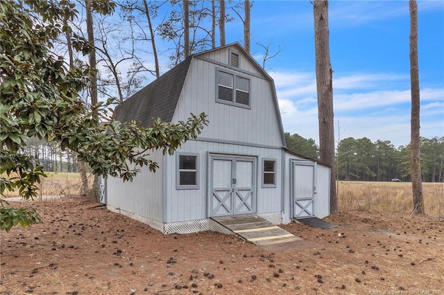 view of outbuilding with an outdoor structure