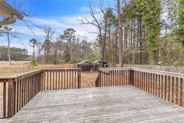 wooden deck featuring fence