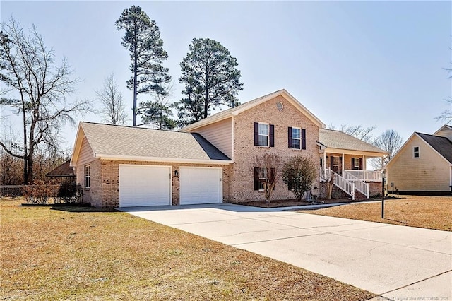 view of front of property with a front lawn, driveway, roof with shingles, a garage, and brick siding