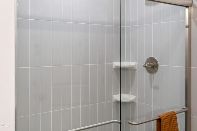 room details with a tile shower