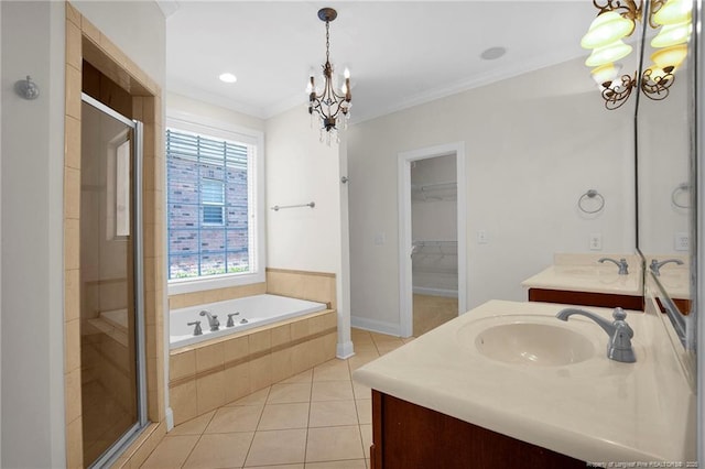 bathroom with tile patterned floors, a notable chandelier, ornamental molding, and a shower stall