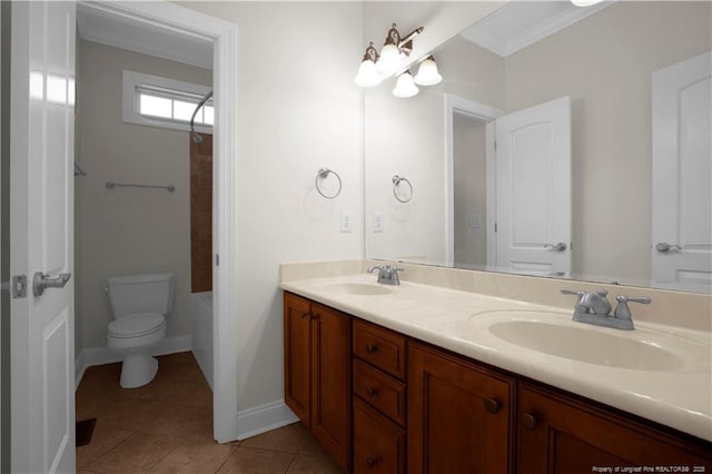 full bathroom with a sink, toilet, double vanity, and tile patterned flooring