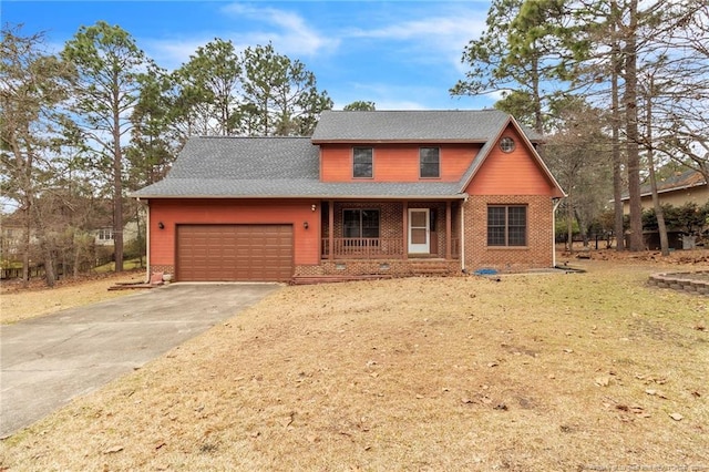 view of front of home with concrete driveway, a porch, brick siding, and a garage