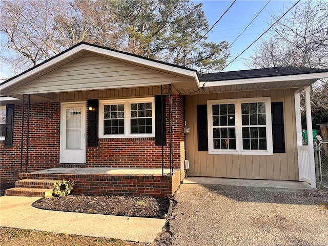 view of front of property featuring brick siding