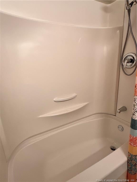 full bath with shower / bath combo with shower curtain