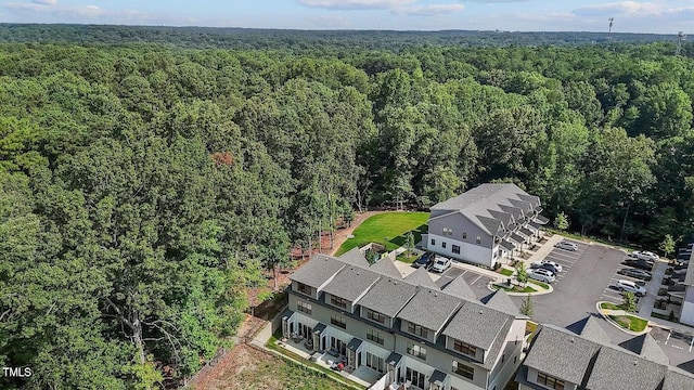 bird's eye view featuring a view of trees