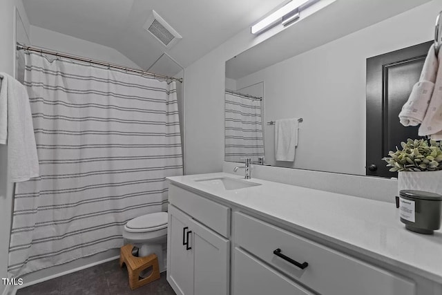 full bathroom with vanity, a shower with shower curtain, visible vents, lofted ceiling, and toilet