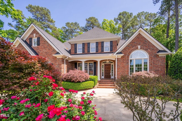 112 Trellingwood Dr, Morrisville, NC 27560 - view of front of property with brick siding and roof with shingles