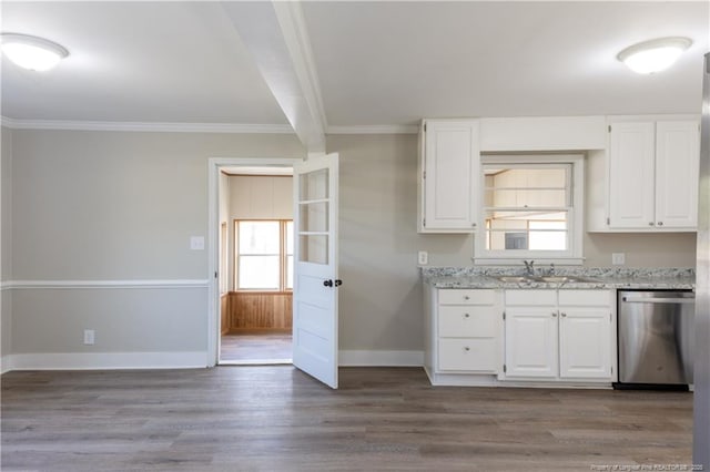 kitchen featuring dishwasher, a sink, white cabinets, light stone countertops, and crown molding