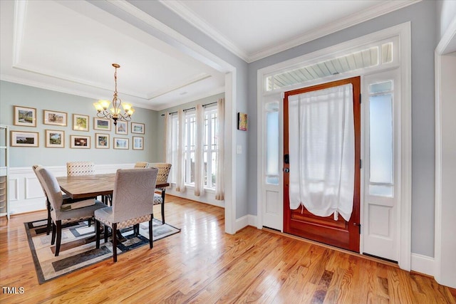 1624 Struble Cir, Willow Springs, NC 27592 - dining area featuring a chandelier, light wood-style flooring, and crown molding
