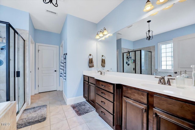 1624 Struble Cir, Willow Springs, NC 27592 - full bathroom with a stall shower, double vanity, and tile patterned flooring