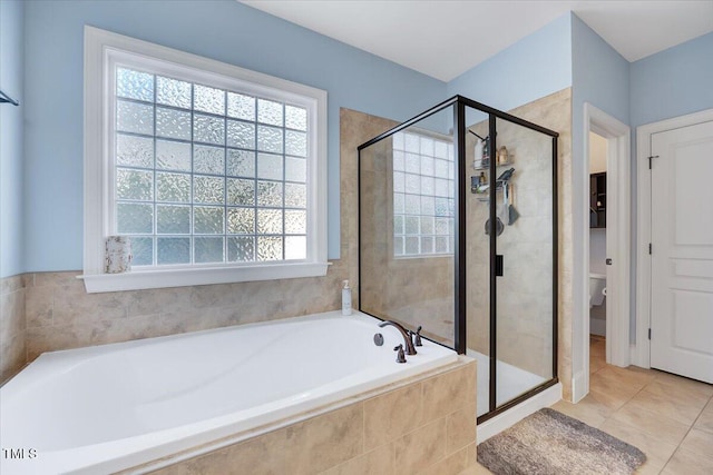 1624 Struble Cir, Willow Springs, NC 27592 - full bath featuring a shower stall, a bath, and tile patterned flooring