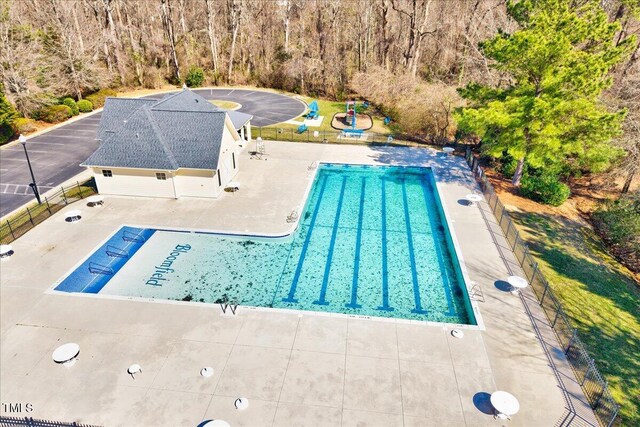 1624 Struble Cir, Willow Springs, NC 27592 - community pool featuring a patio area