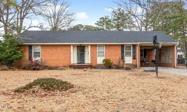 single story home with brick siding