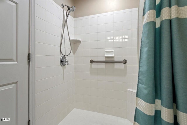 bathroom featuring a stall shower
