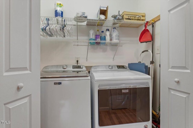 laundry area featuring laundry area and independent washer and dryer
