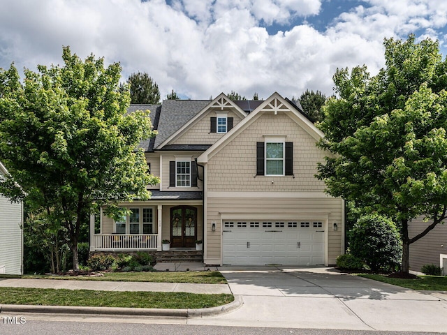 730 Toms Creek Rd, Cary, NC 27519 - craftsman-style home with covered porch, roof with shingles, a garage, and driveway