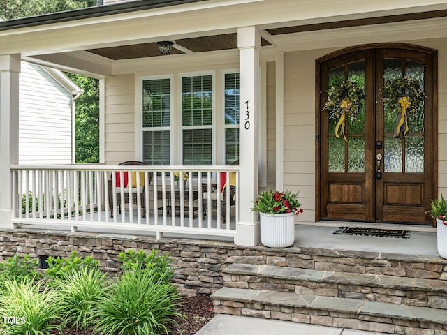 730 Toms Creek Rd, Cary, NC 27519 - view of exterior entry featuring a porch