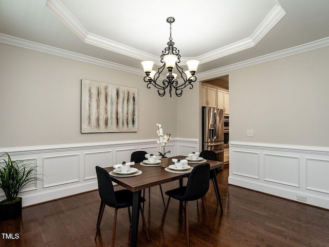 730 Toms Creek Rd, Cary, NC 27519 - dining room with ornamental molding, dark wood-style floors, wainscoting, a raised ceiling, and a notable chandelier
