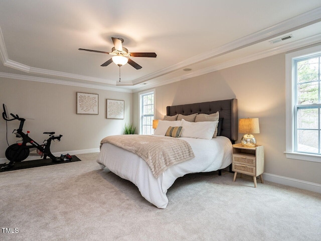 730 Toms Creek Rd, Cary, NC 27519 - carpeted bedroom featuring a raised ceiling, ornamental molding, multiple windows, and visible vents