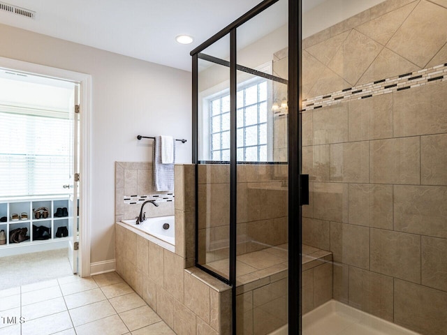 730 Toms Creek Rd, Cary, NC 27519 - full bathroom with a shower stall, tile patterned floors, visible vents, and plenty of natural light