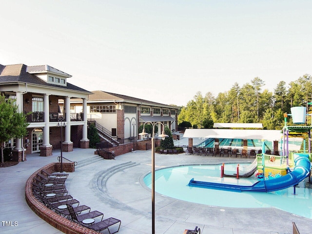 730 Toms Creek Rd, Cary, NC 27519 - exterior space with a water play area, a patio area, and stairs