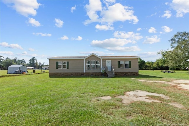 manufactured / mobile home with crawl space and a front yard