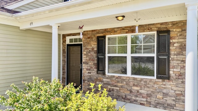 69 Florence Dr, Clayton, NC 27527 - view of exterior entry with stone siding and covered porch