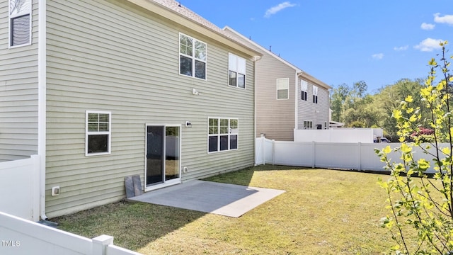69 Florence Dr, Clayton, NC 27527 - back of property featuring a patio, a yard, and fence