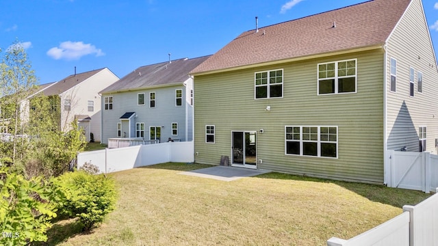 69 Florence Dr, Clayton, NC 27527 - back of house with a patio, a fenced backyard, and a lawn