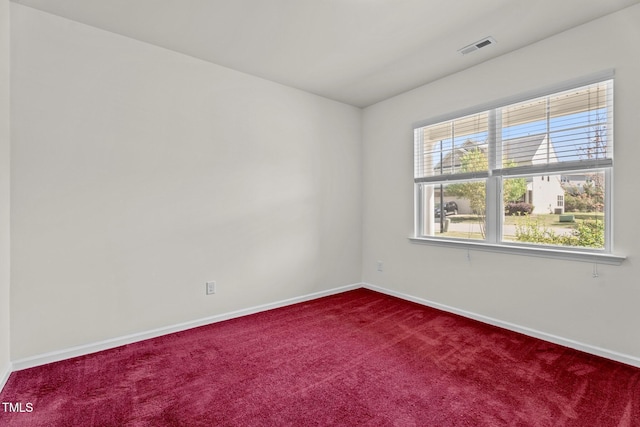 69 Florence Dr, Clayton, NC 27527 - unfurnished room with visible vents, baseboards, and dark carpet
