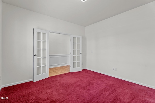 69 Florence Dr, Clayton, NC 27527 - unfurnished room featuring french doors, baseboards, and carpet flooring