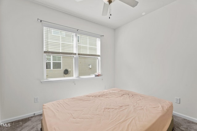 69 Florence Dr, Clayton, NC 27527 - bedroom with baseboards, a ceiling fan, and carpet floors