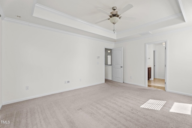 69 Florence Dr, Clayton, NC 27527 - unfurnished bedroom with light carpet, baseboards, a tray ceiling, and crown molding