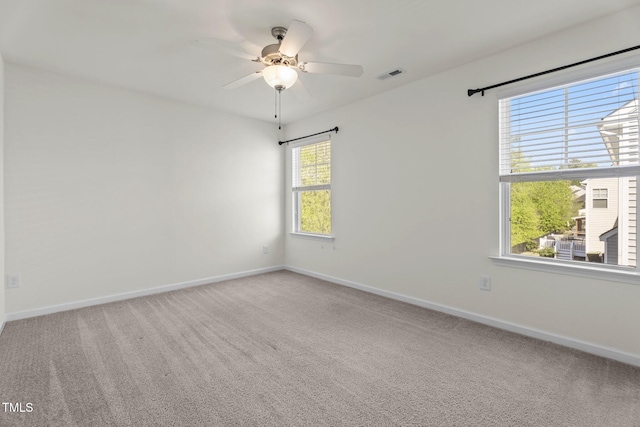 69 Florence Dr, Clayton, NC 27527 - carpeted empty room with visible vents, baseboards, and a ceiling fan