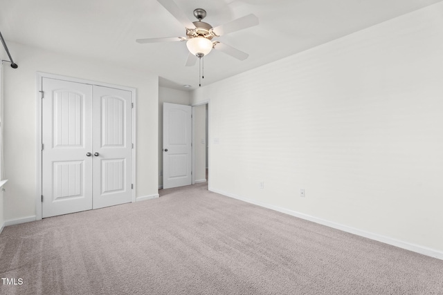 69 Florence Dr, Clayton, NC 27527 - unfurnished bedroom with carpet floors, baseboards, a closet, and ceiling fan