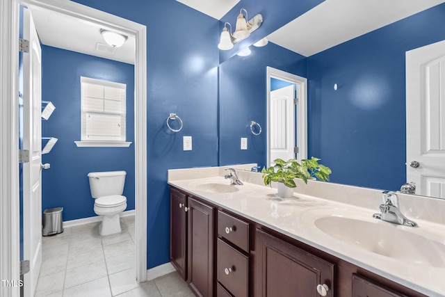 69 Florence Dr, Clayton, NC 27527 - full bathroom with a sink, tile patterned floors, double vanity, and baseboards