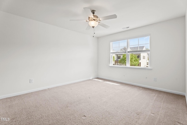 69 Florence Dr, Clayton, NC 27527 - spare room with carpet, visible vents, baseboards, and a ceiling fan