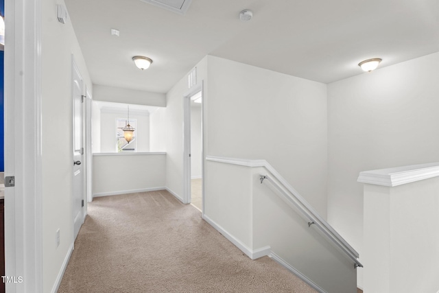 69 Florence Dr, Clayton, NC 27527 - hall with baseboards, an upstairs landing, and carpet