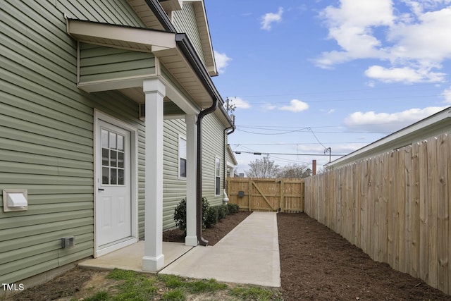 view of yard with a gate and fence