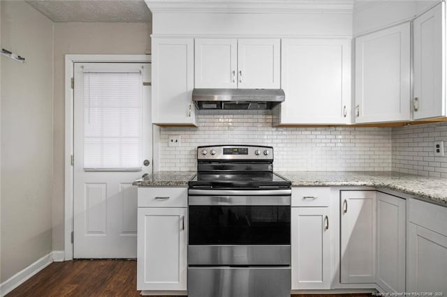 kitchen featuring stainless steel electric range oven, decorative backsplash, dark wood-type flooring, under cabinet range hood, and white cabinetry