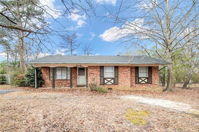 single story home with brick siding