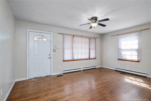 entrance foyer with wood finished floors, baseboards, ceiling fan, and baseboard heating