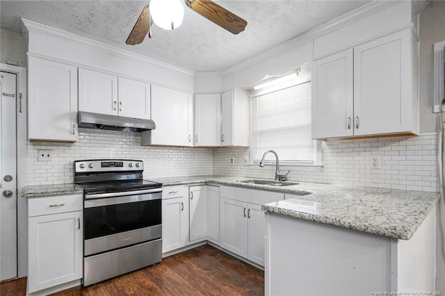 kitchen with a sink, dark wood finished floors, under cabinet range hood, electric stove, and white cabinets